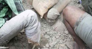 A man trapped in rubble after an earthquake devastated Nepal on April 25, 2015. (Source: Twitter)